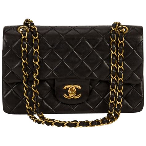 black gold chanel bag|black chanel bag gold hardware.